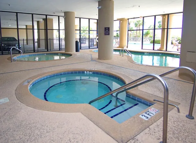 Indoor pool and spa common area at the Southwind property