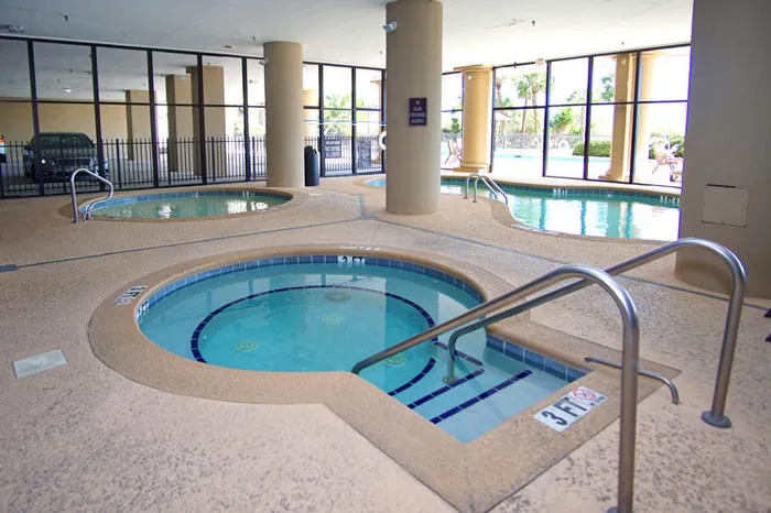 Indoor pool and spa common area at the Southwind property